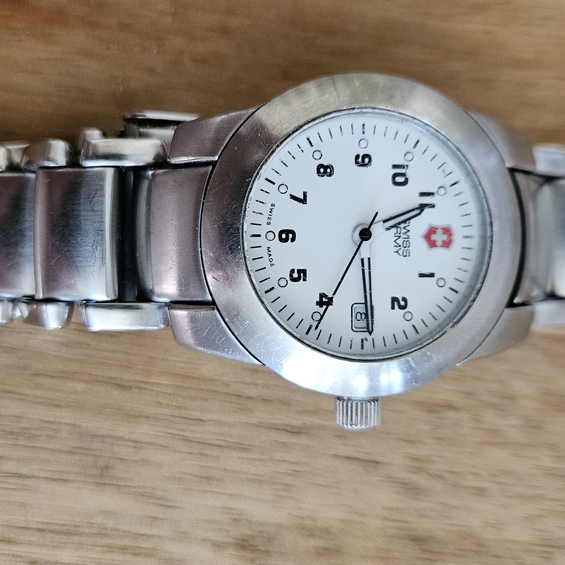 Victorinox Stainless Steel Swiss Watch With White Dial And Red Shield